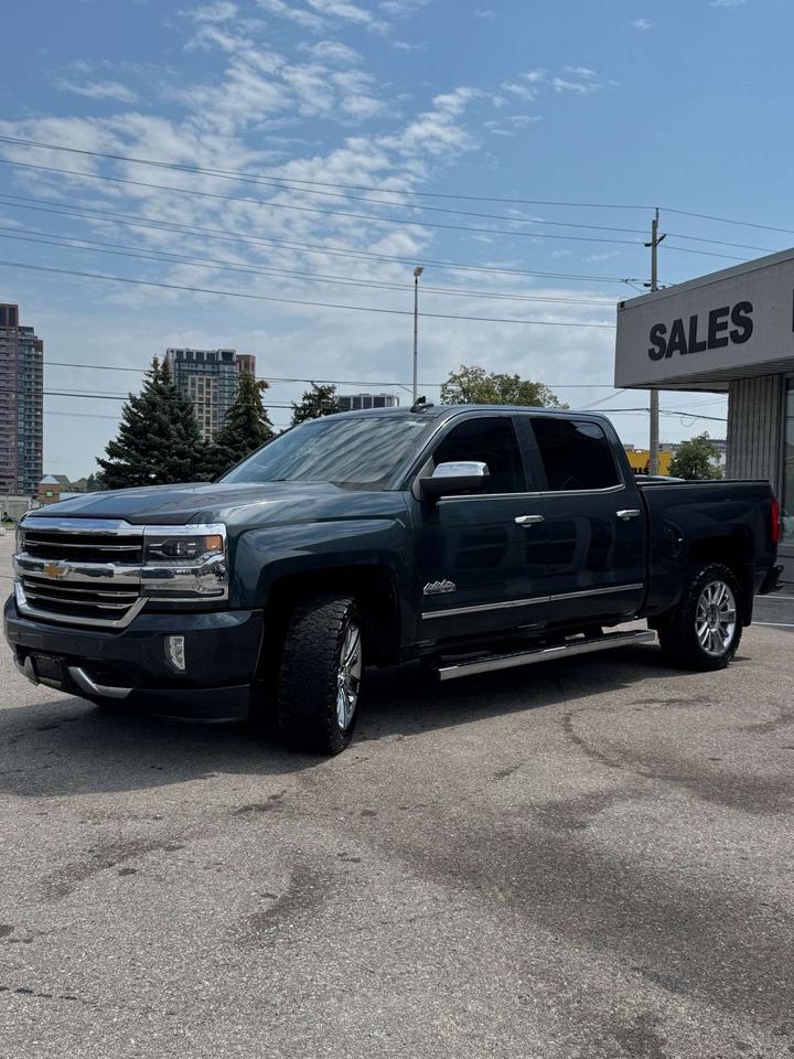 2017 Chevrolet Silverado 1500 4WD Crew Cab 143.5 High Country 5'8 Lined Box Photo