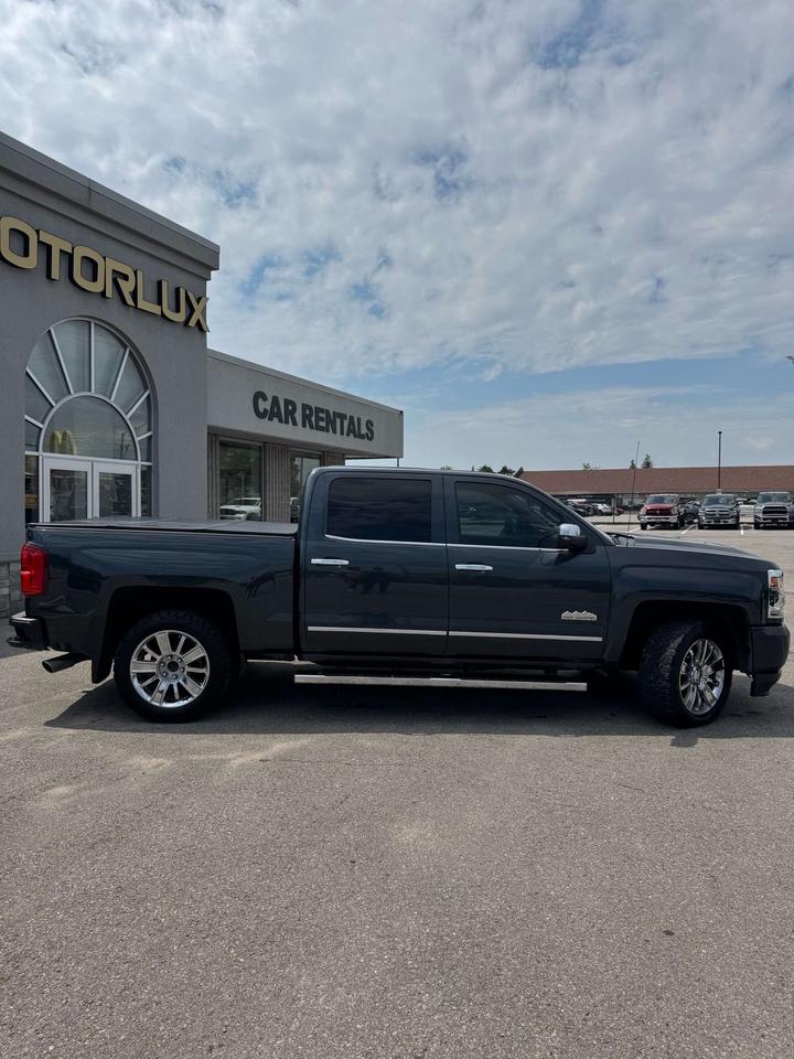 2017 Chevrolet Silverado 1500 4WD Crew Cab 143.5 High Country 5'8 Lined Box Photo