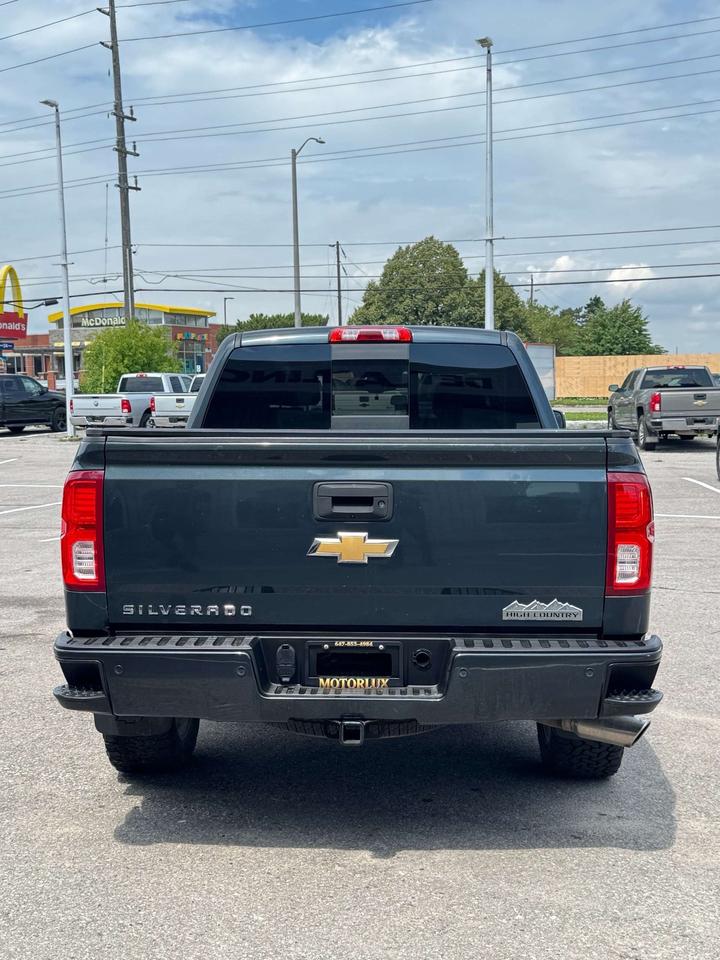 2017 Chevrolet Silverado 1500 4WD Crew Cab 143.5 High Country 5'8 Lined Box Photo