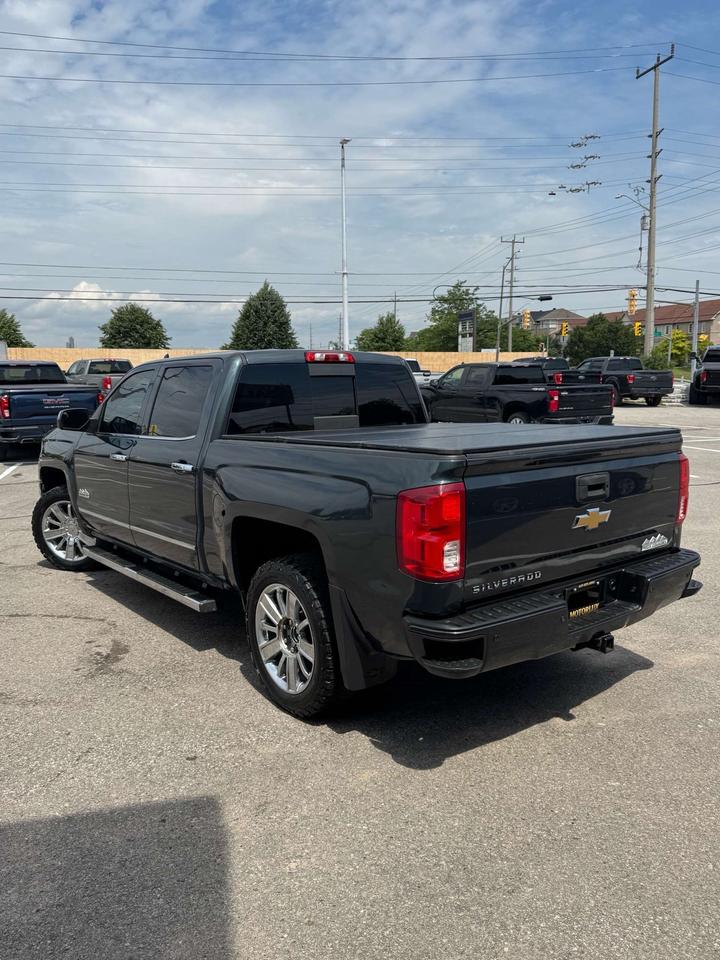 2017 Chevrolet Silverado 1500 4WD Crew Cab 143.5 High Country 5'8 Lined Box Photo