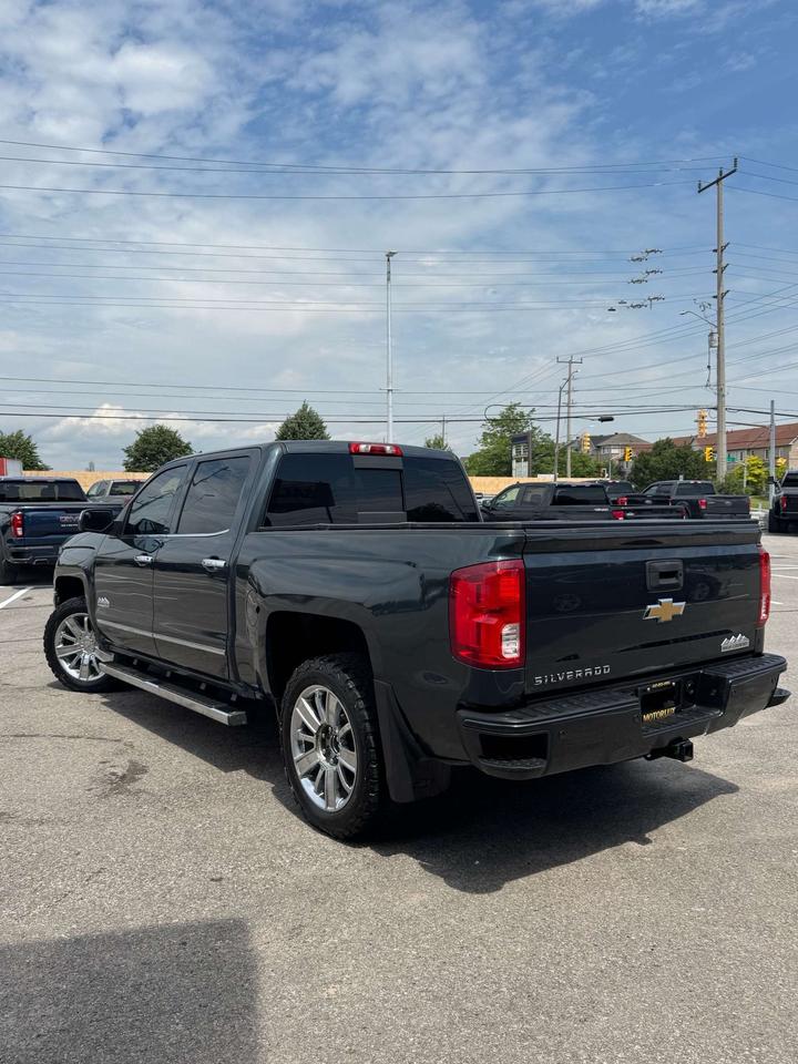 2017 Chevrolet Silverado 1500 4WD Crew Cab 143.5 High Country 5'8 Lined Box Photo