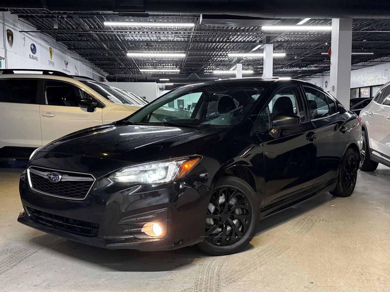 2019 Subaru Impreza Sport l 5Spd l 2.0L l 4Cyl l Symmetrical AWD l Photo