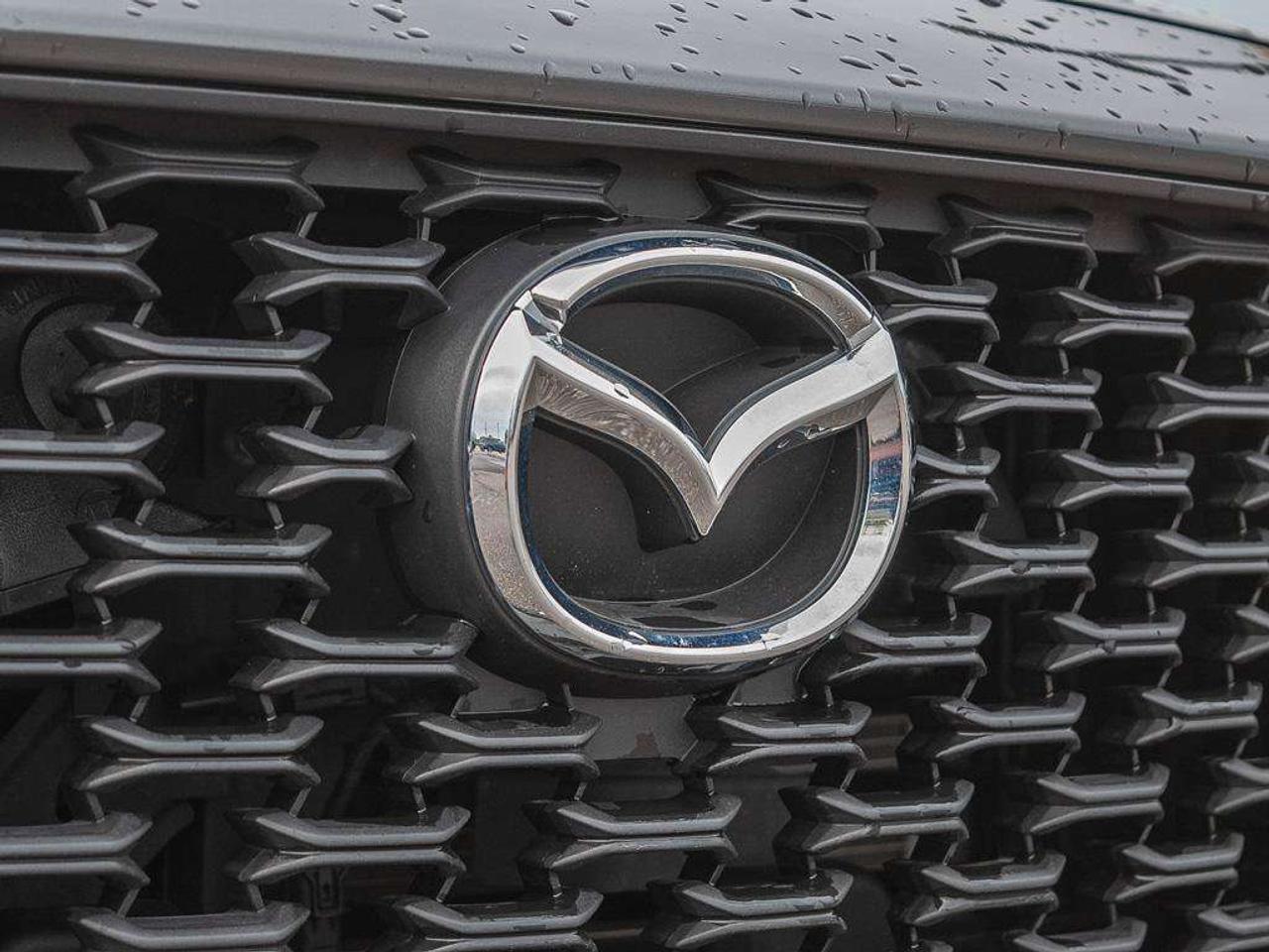2024 Mazda CX-50 GS-L   AWD   Front Collision Mitigation  Blind Spot Monitor  Adaptive Cruise Control Photo