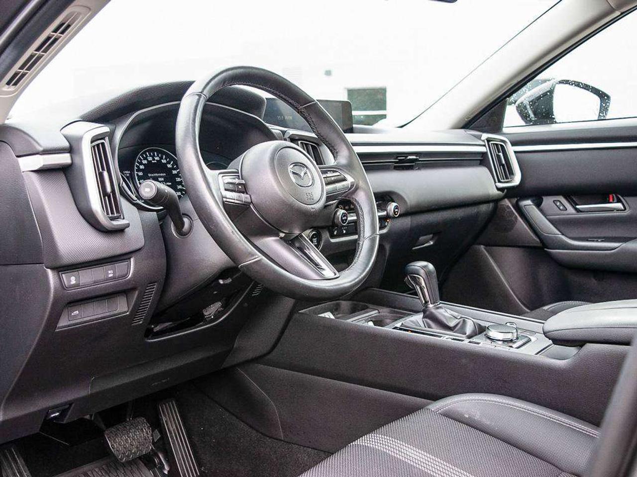 2024 Mazda CX-50 GS-L   AWD   Front Collision Mitigation  Blind Spot Monitor  Adaptive Cruise Control Photo