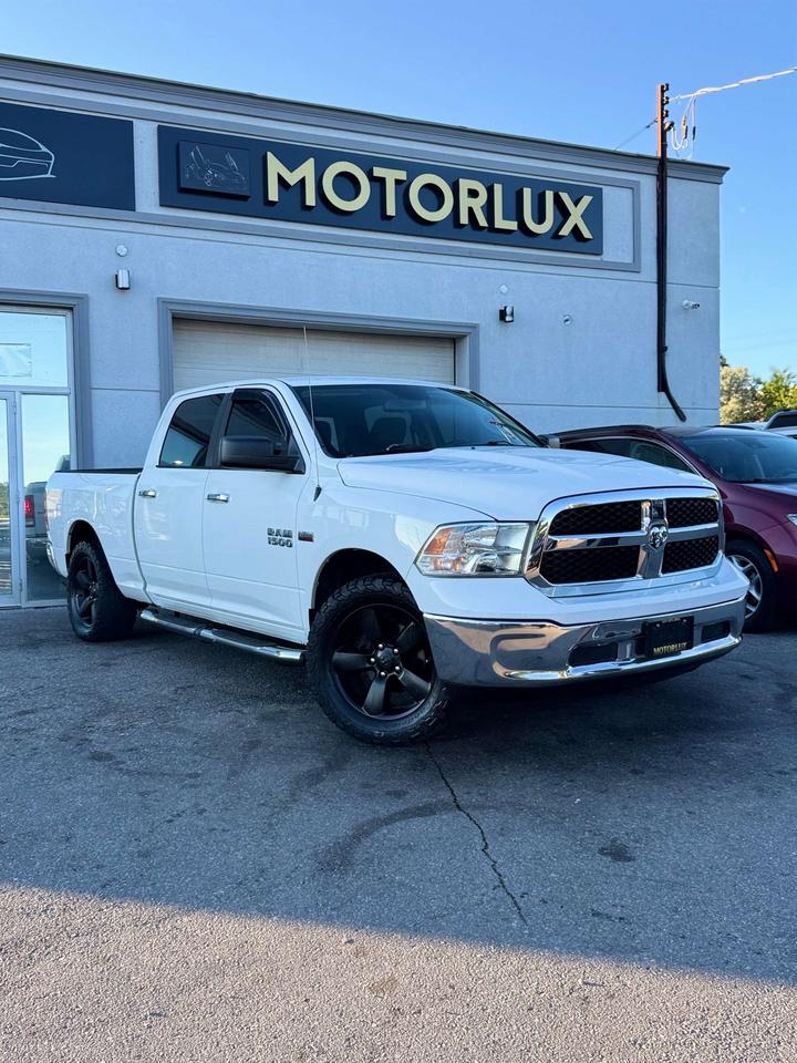 2016 RAM 1500 4WD Crew Cab 6'4 149 SLT Photo5