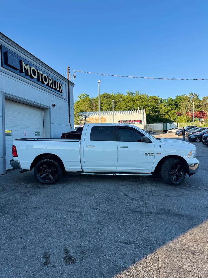 2016 RAM 1500 4WD Crew Cab 6'4 149 SLT Photo4