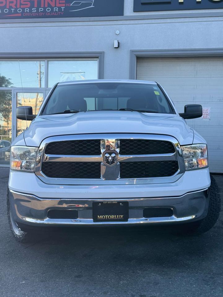 2016 RAM 1500 4WD Crew Cab 6'4 149 SLT Photo2