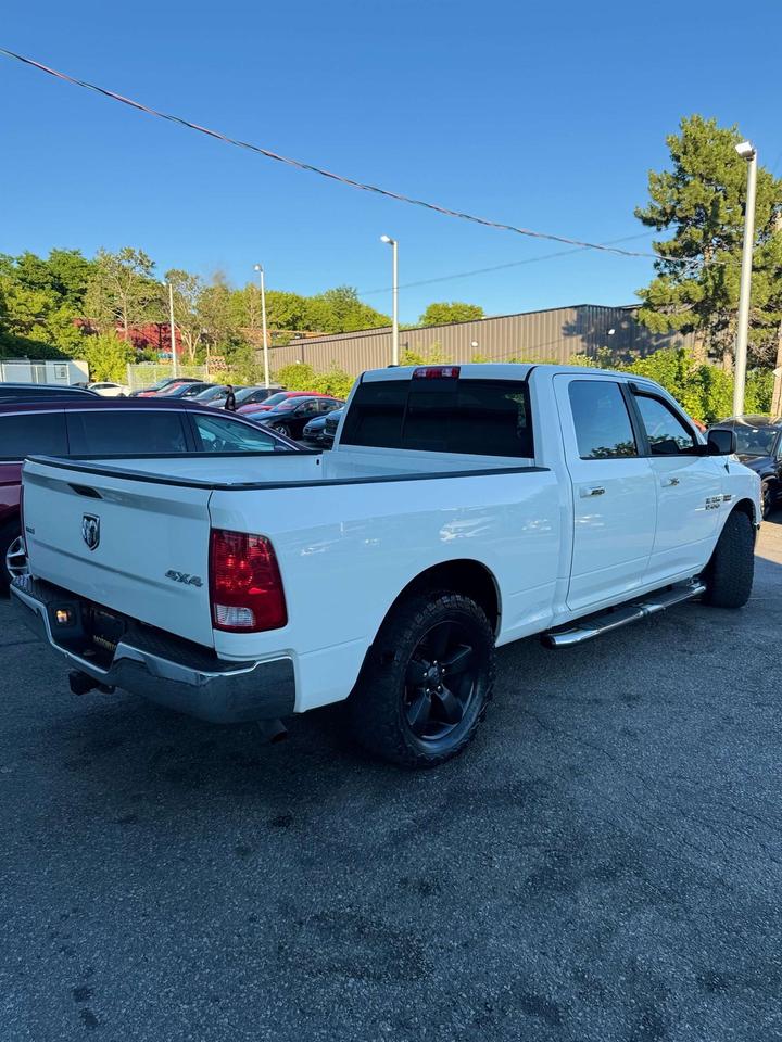 2016 RAM 1500 4WD Crew Cab 6'4 149 SLT Photo
