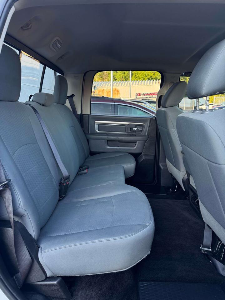 2016 RAM 1500 4WD Crew Cab 6'4 149 SLT Photo