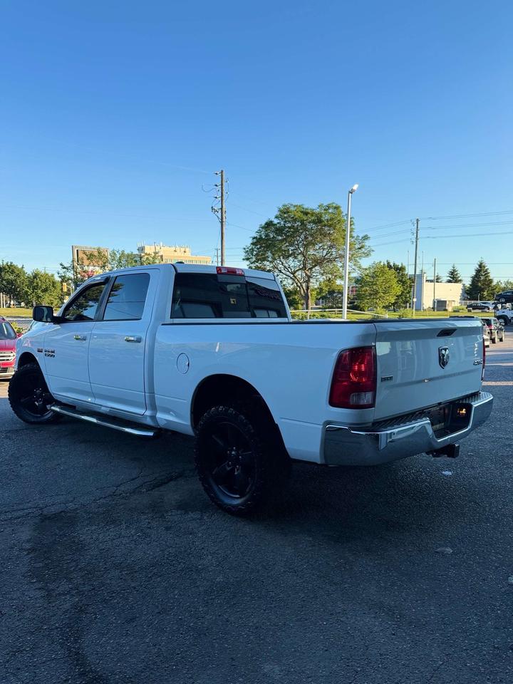 2016 RAM 1500 4WD Crew Cab 6'4 149 SLT Photo