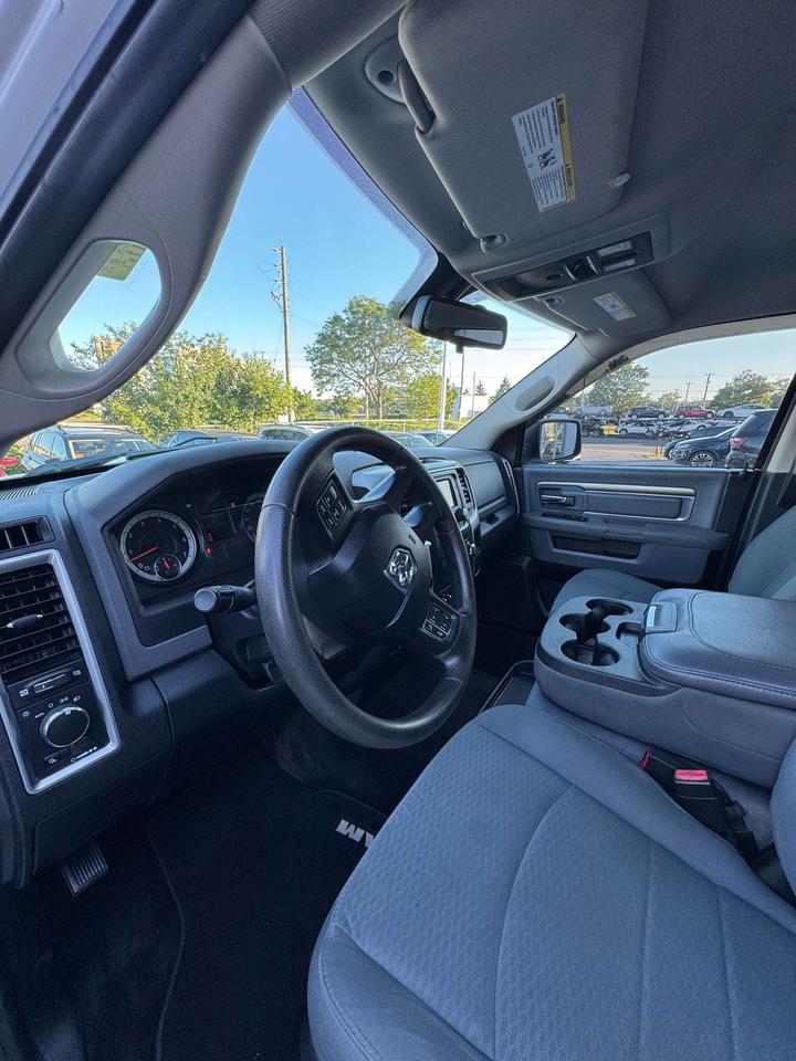 2016 RAM 1500 4WD Crew Cab 6'4 149 SLT Photo