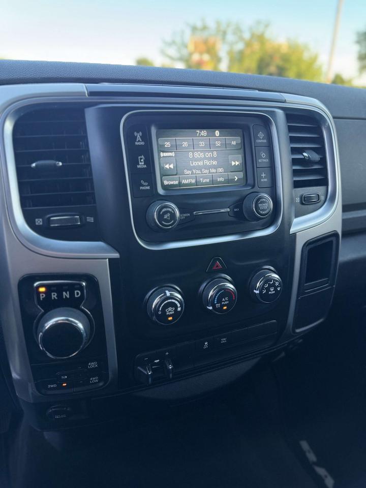2016 RAM 1500 4WD Crew Cab 6'4 149 SLT Photo