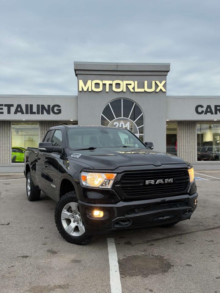 2020 RAM 1500 Big Horn 4x4 Quad Cab 6'4 Box Photo1