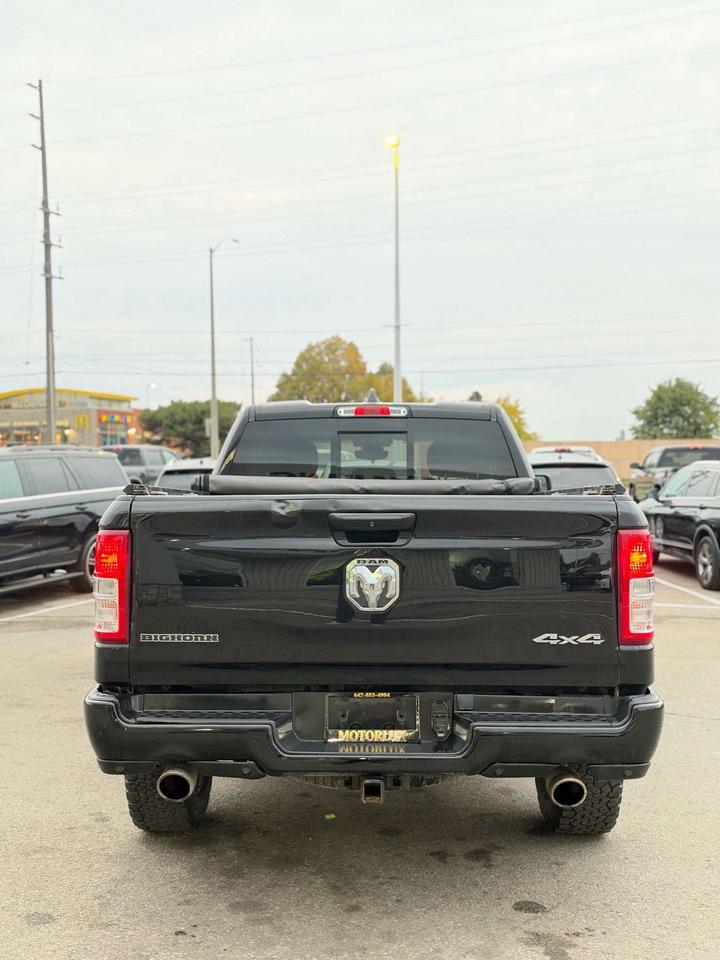 2020 RAM 1500 Big Horn 4x4 Quad Cab 6'4 Box Photo