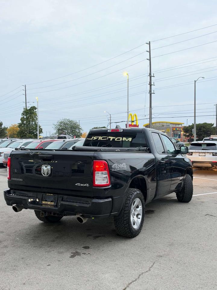 2020 RAM 1500 Big Horn 4x4 Quad Cab 6'4 Box Photo