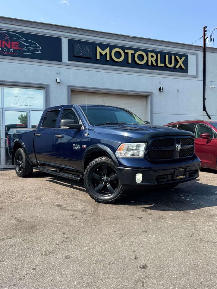 2017 RAM 1500 4WD Crew Cab SLT 6'4 Box Photo1