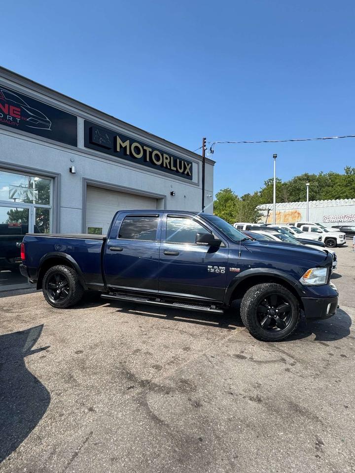 2017 RAM 1500 4WD Crew Cab SLT 6'4 Box Photo