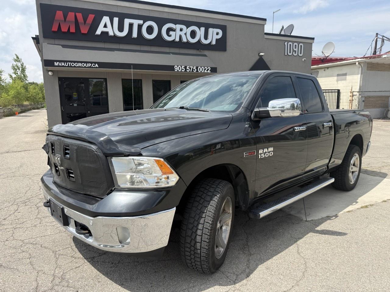 2016 RAM 1500 4WD Quad Cab 6.4 Ft Box Big Horn Photo