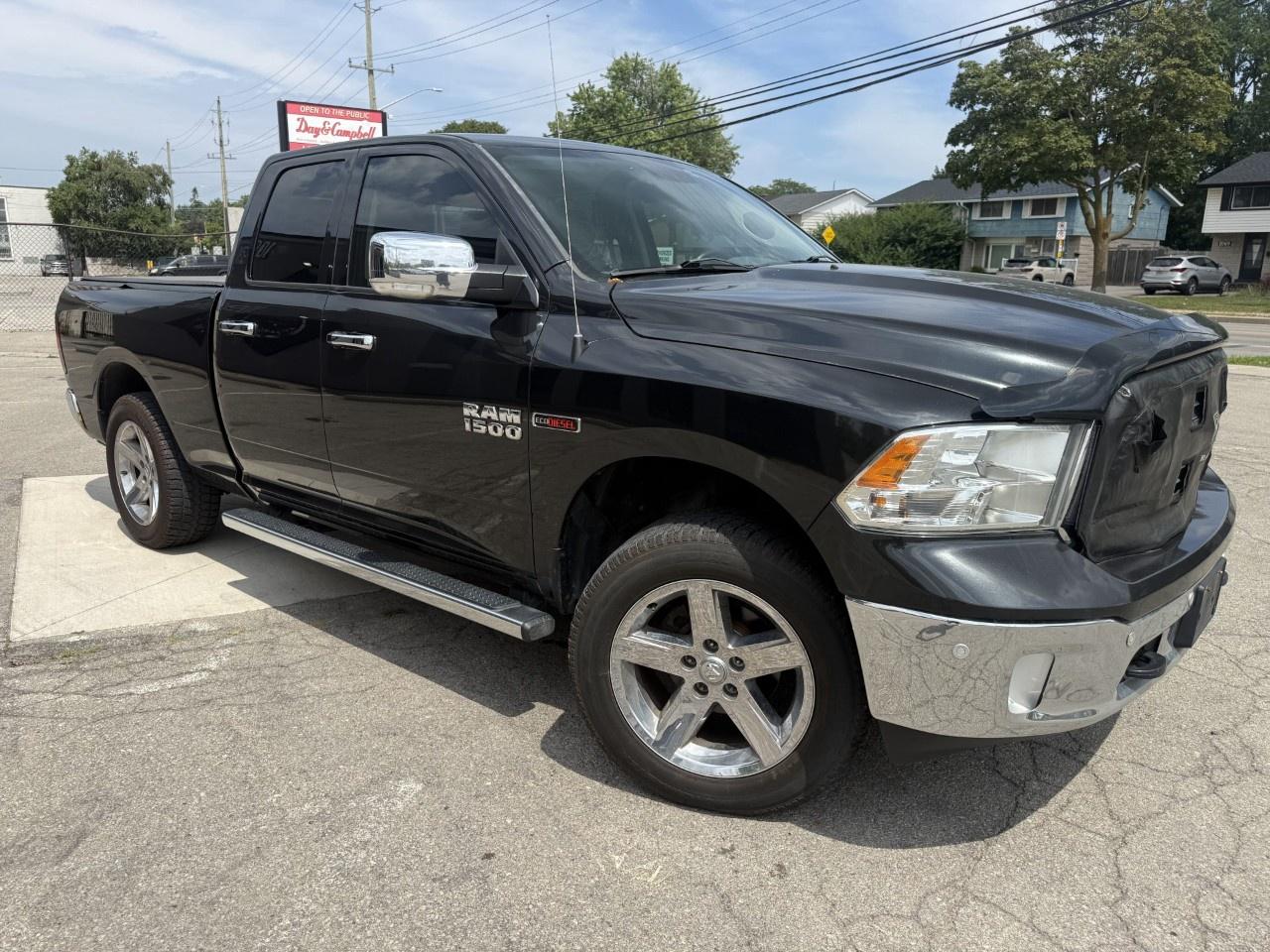 2016 RAM 1500 4WD Quad Cab 6.4 Ft Box Big Horn Photo