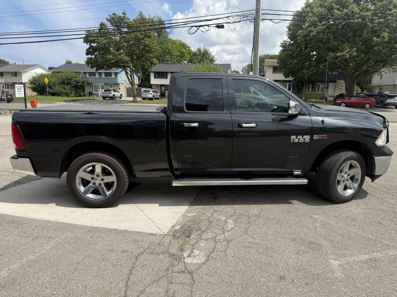 2016 RAM 1500 4WD Quad Cab 6.4 Ft Box Big Horn Photo