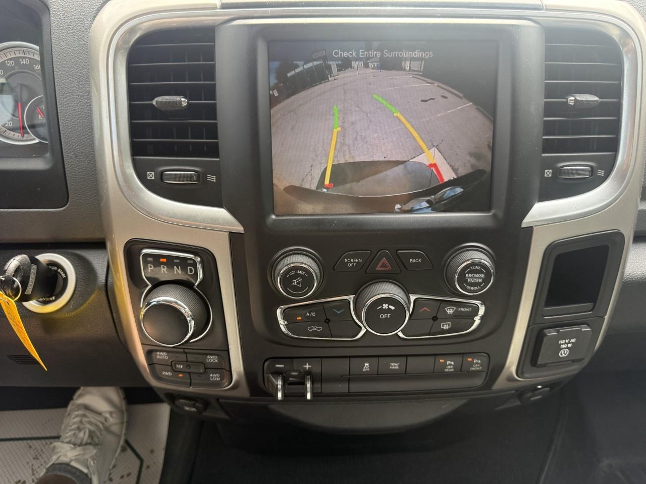 2016 RAM 1500 4WD Quad Cab 6.4 Ft Box Big Horn Photo