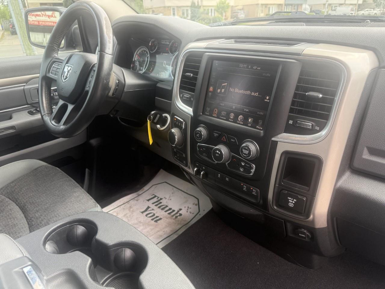2016 RAM 1500 4WD Quad Cab 6.4 Ft Box Big Horn Photo