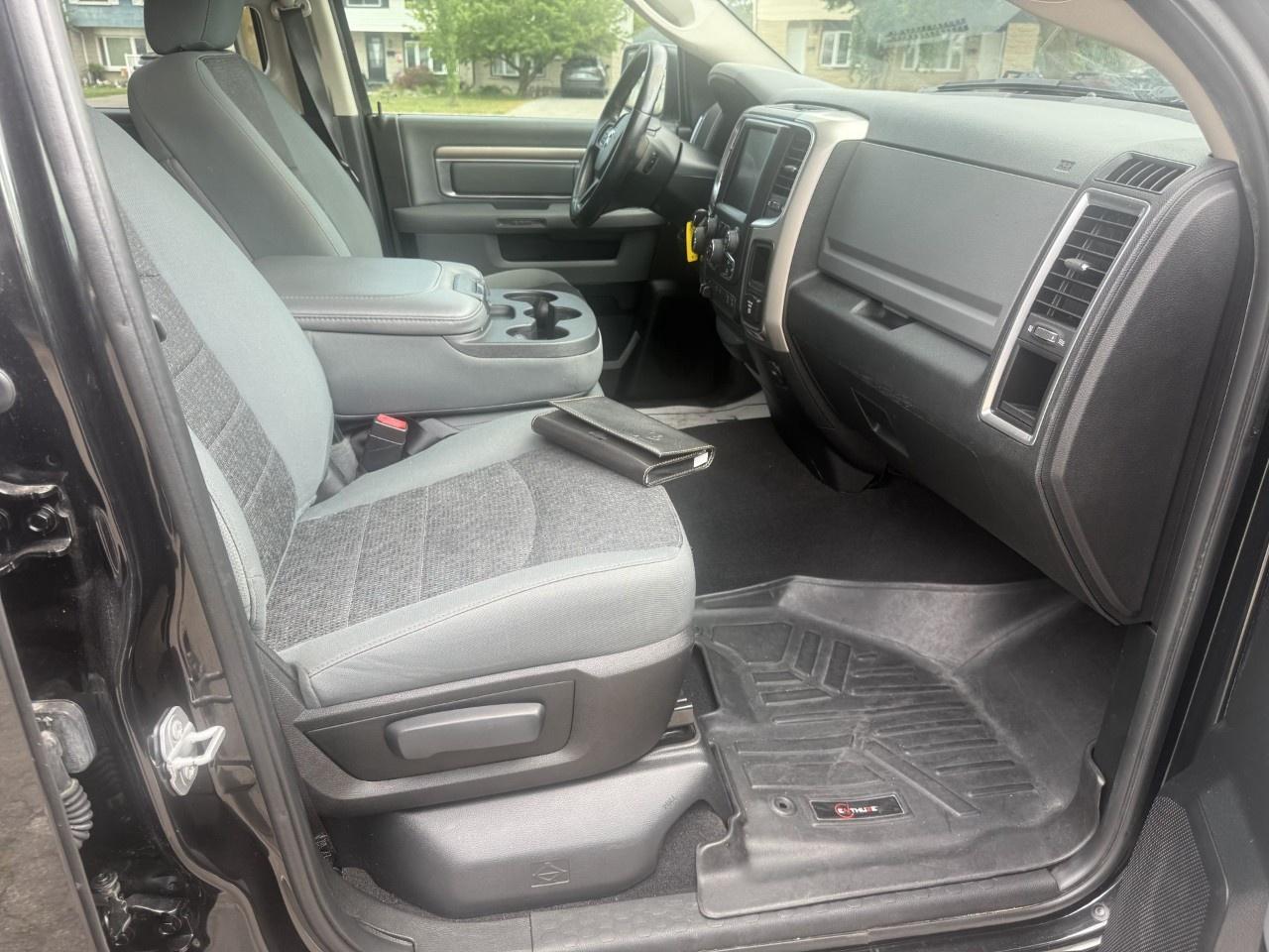 2016 RAM 1500 4WD Quad Cab 6.4 Ft Box Big Horn Photo