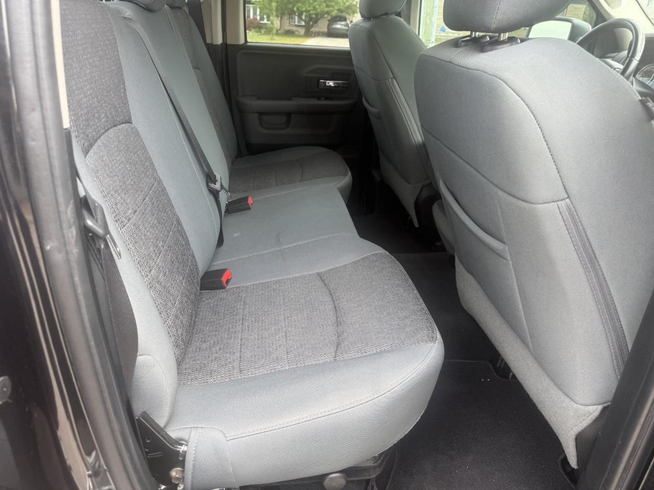 2016 RAM 1500 4WD Quad Cab 6.4 Ft Box Big Horn Photo