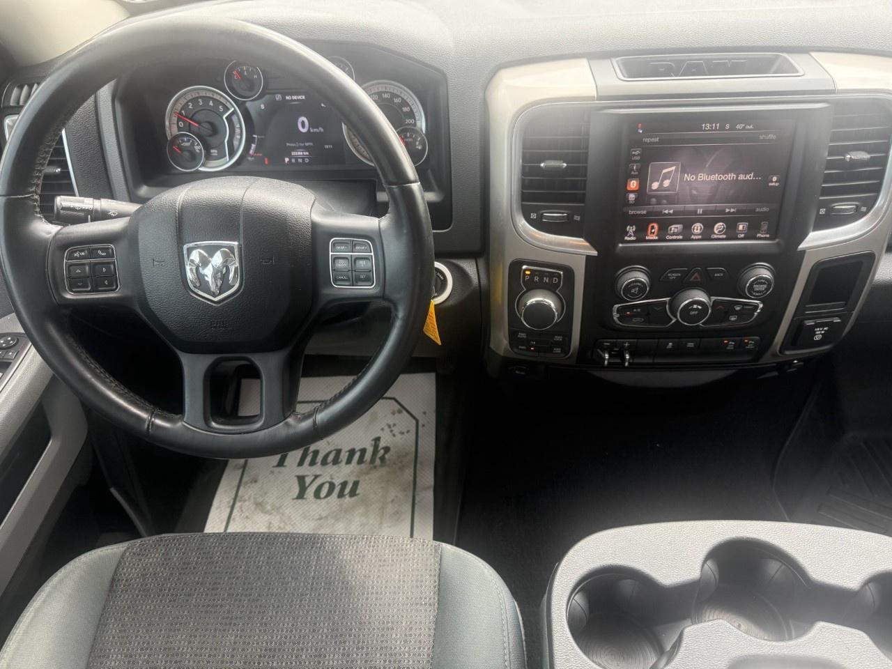 2016 RAM 1500 4WD Quad Cab 6.4 Ft Box Big Horn Photo
