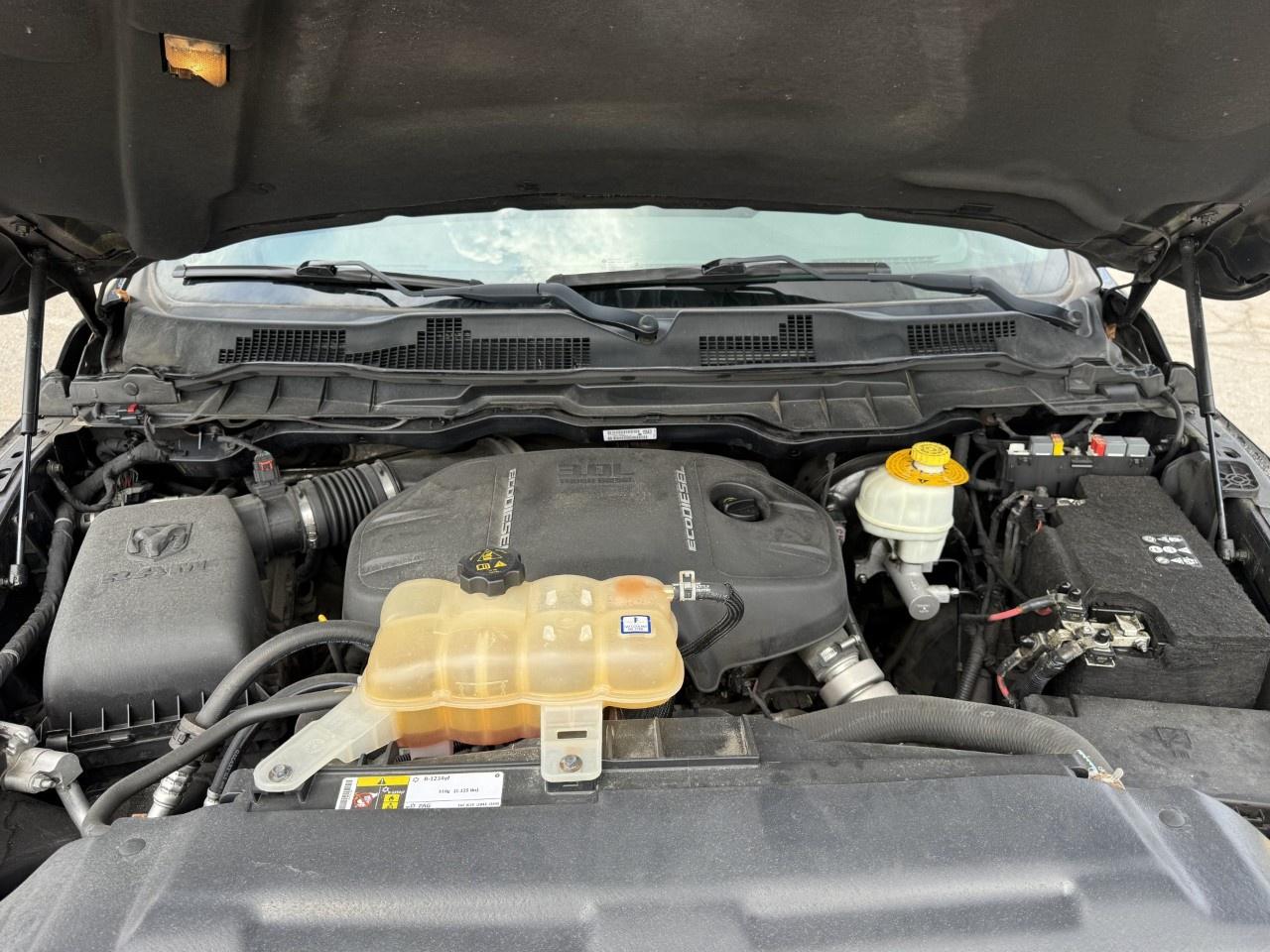 2016 RAM 1500 4WD Quad Cab 6.4 Ft Box Big Horn Photo