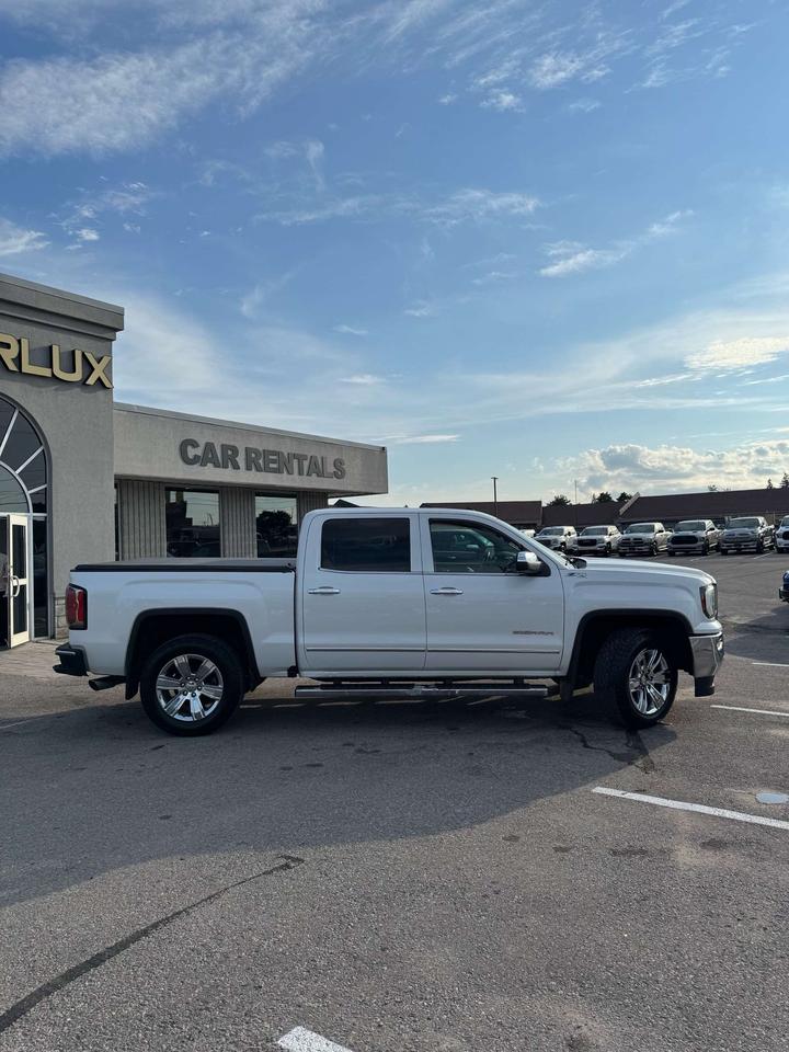 2016 GMC Sierra 1500 4WD Crew Cab 143.5 SLT 5'8 Box Photo