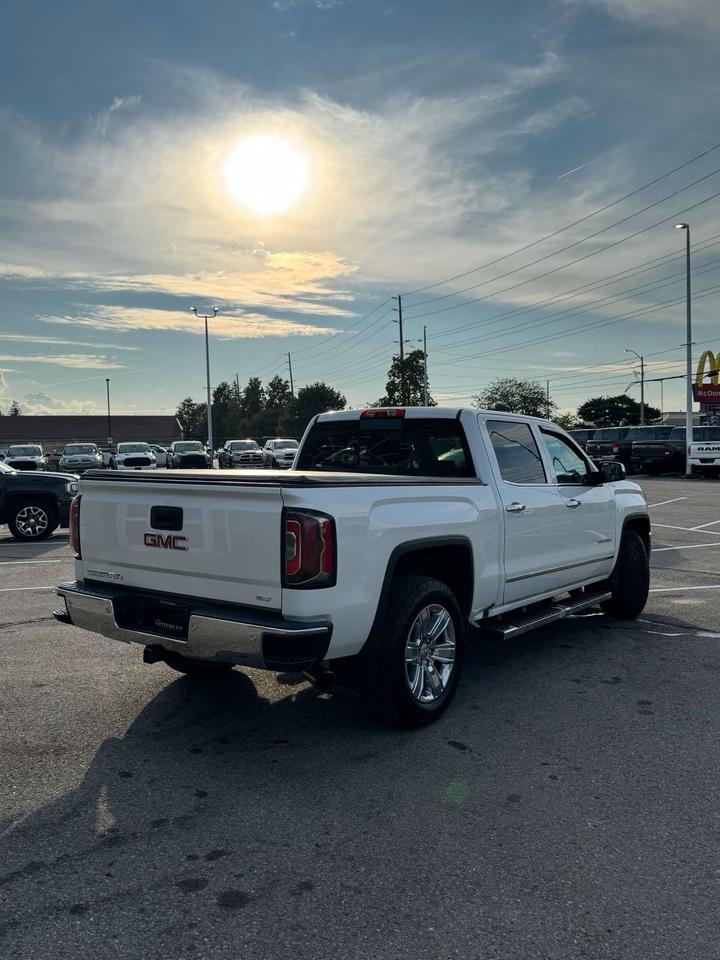 2016 GMC Sierra 1500 4WD Crew Cab 143.5 SLT 5'8 Box Photo