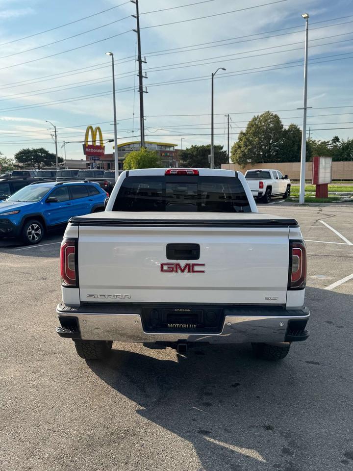 2016 GMC Sierra 1500 4WD Crew Cab 143.5 SLT 5'8 Box Photo