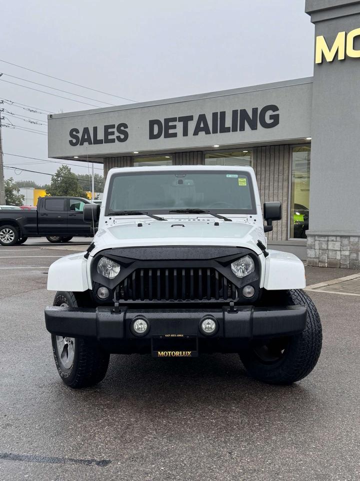 2016 Jeep Wrangler 4WD 4DR SAHARA Photo