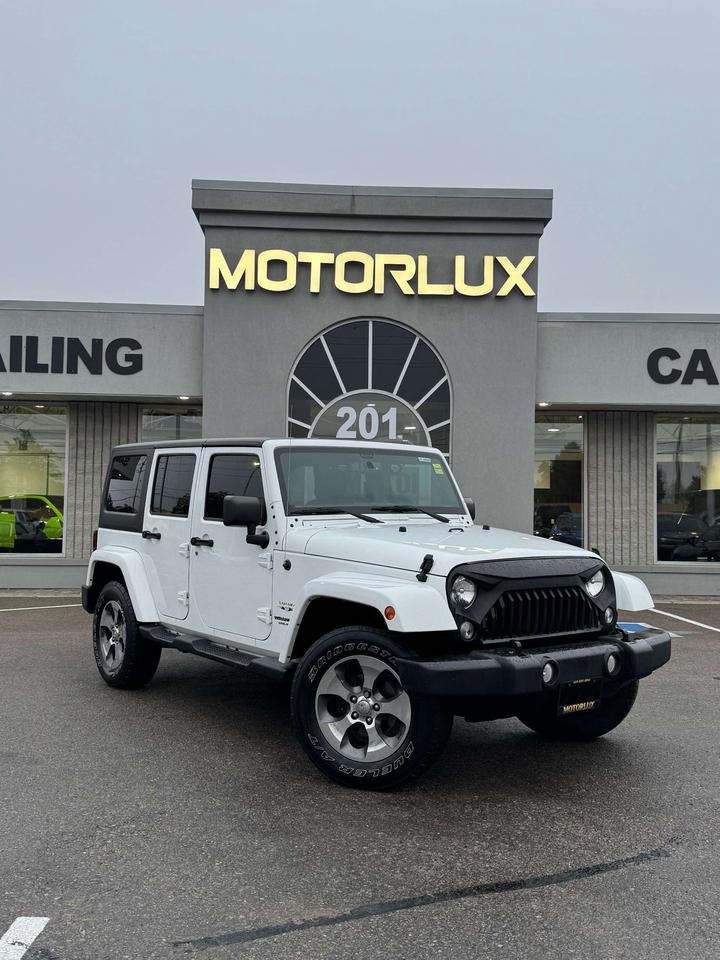 2016 Jeep Wrangler 4WD 4DR SAHARA Photo