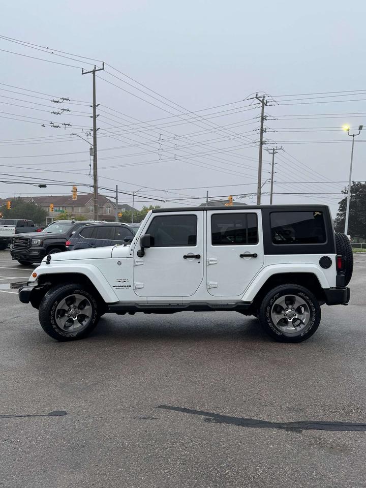 2016 Jeep Wrangler 4WD 4DR SAHARA Photo