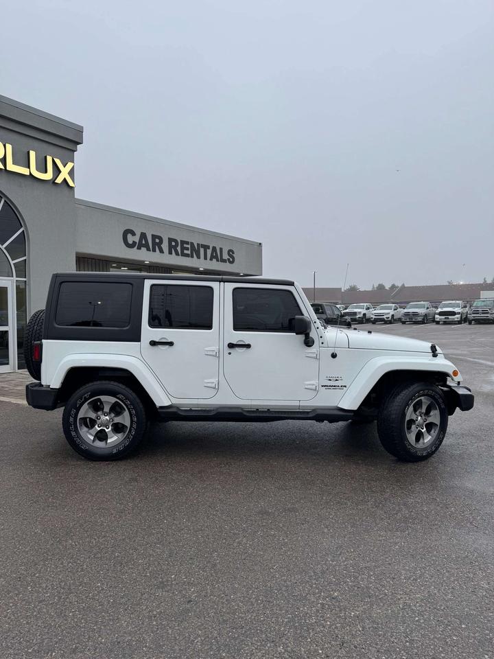2016 Jeep Wrangler 4WD 4DR SAHARA Photo