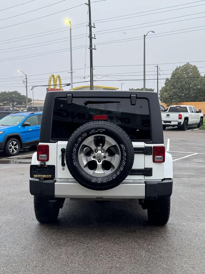 2016 Jeep Wrangler 4WD 4DR SAHARA Photo