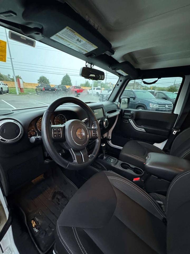 2016 Jeep Wrangler 4WD 4DR SAHARA Photo