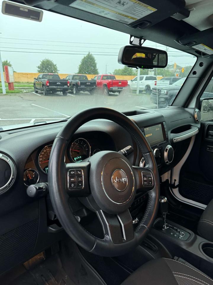 2016 Jeep Wrangler 4WD 4DR SAHARA Photo
