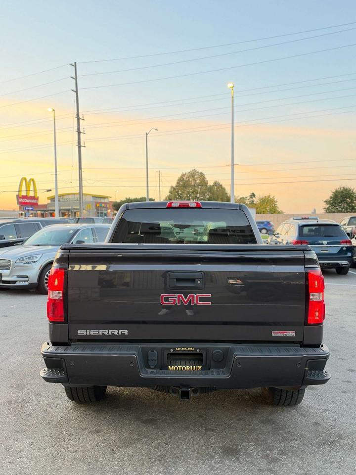 2015 GMC Sierra 1500 4WD Crew Cab 143.5 SLT Photo