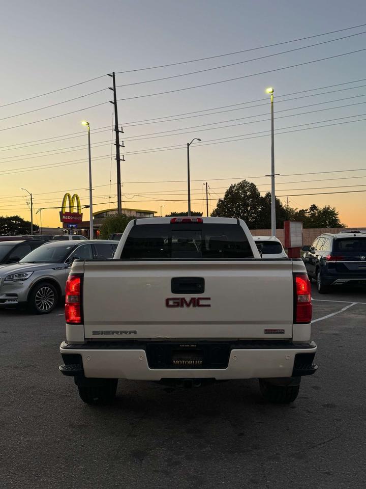 2015 GMC Sierra 1500 4WD Crew Cab 143.5 SLT Photo