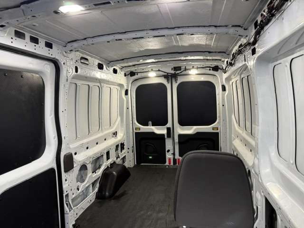 2020 Ford Transit Mid Roof, Loaded, 148 Wheel Base.  98,000 kms Photo