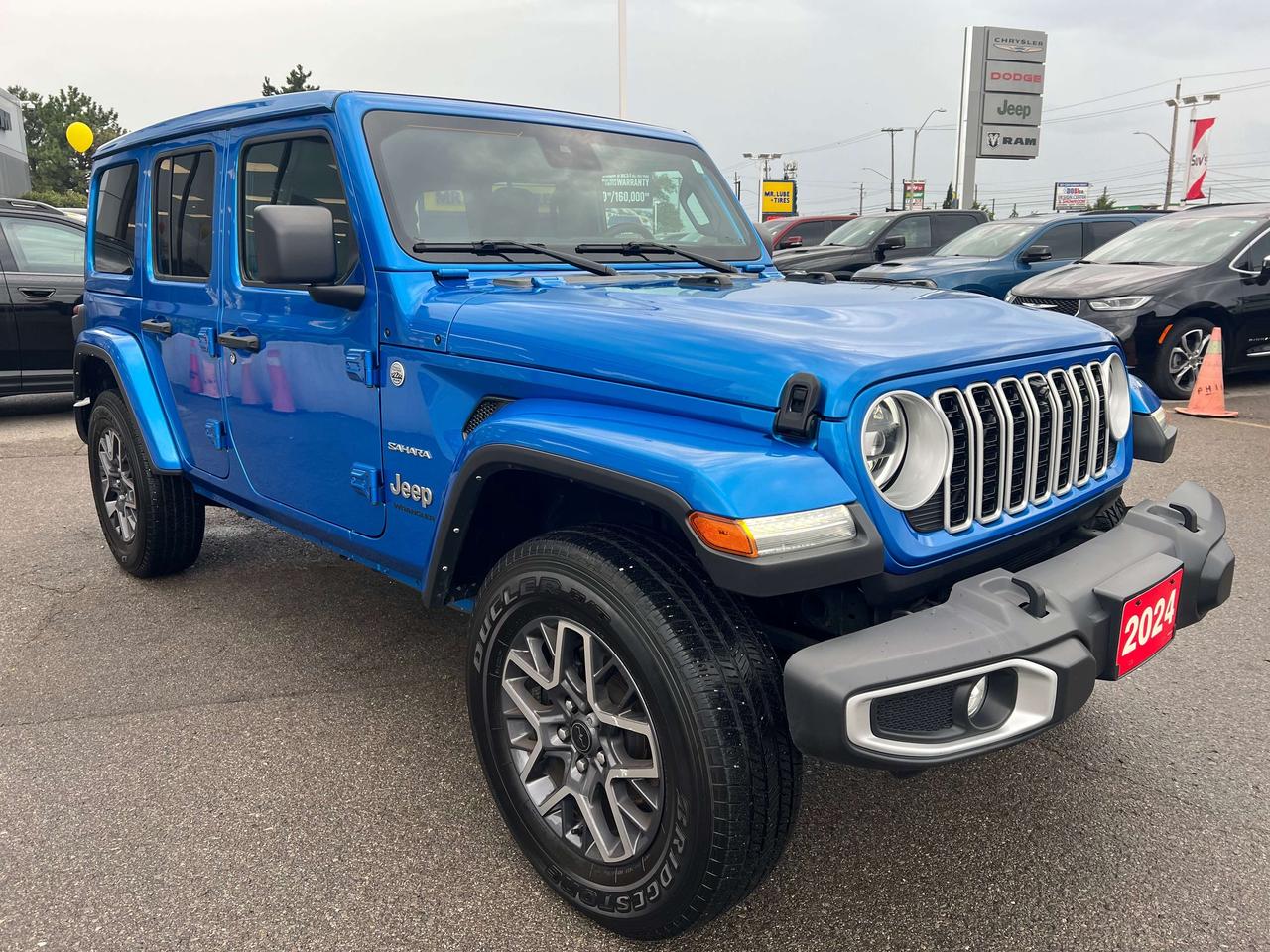 2024 Jeep Wrangler Sahara *LTHR *SKY PWR TOP *PWR SEATS *NAVI *ALPINE Photo