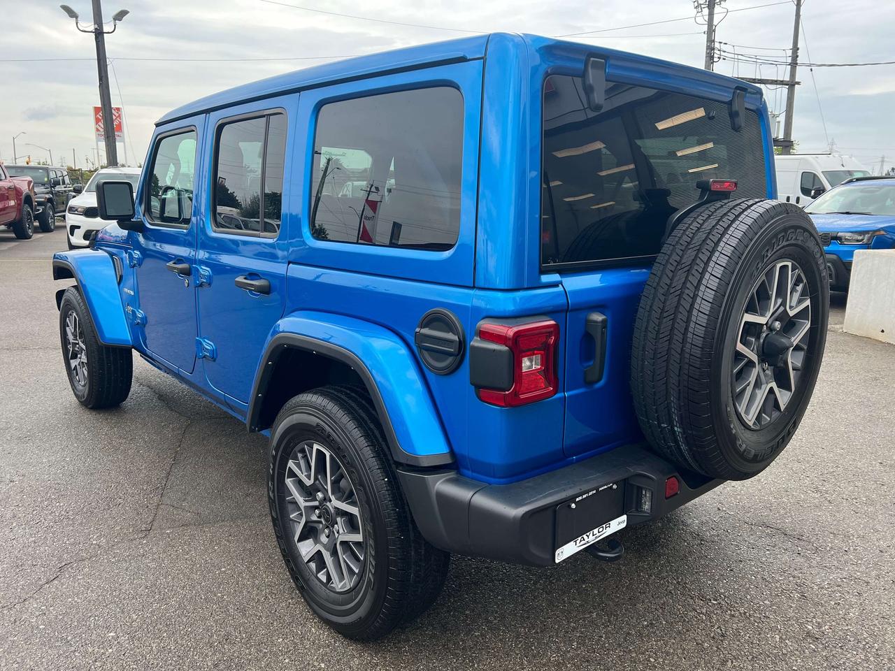 2024 Jeep Wrangler Sahara *LTHR *SKY PWR TOP *PWR SEATS *NAVI *ALPINE Photo