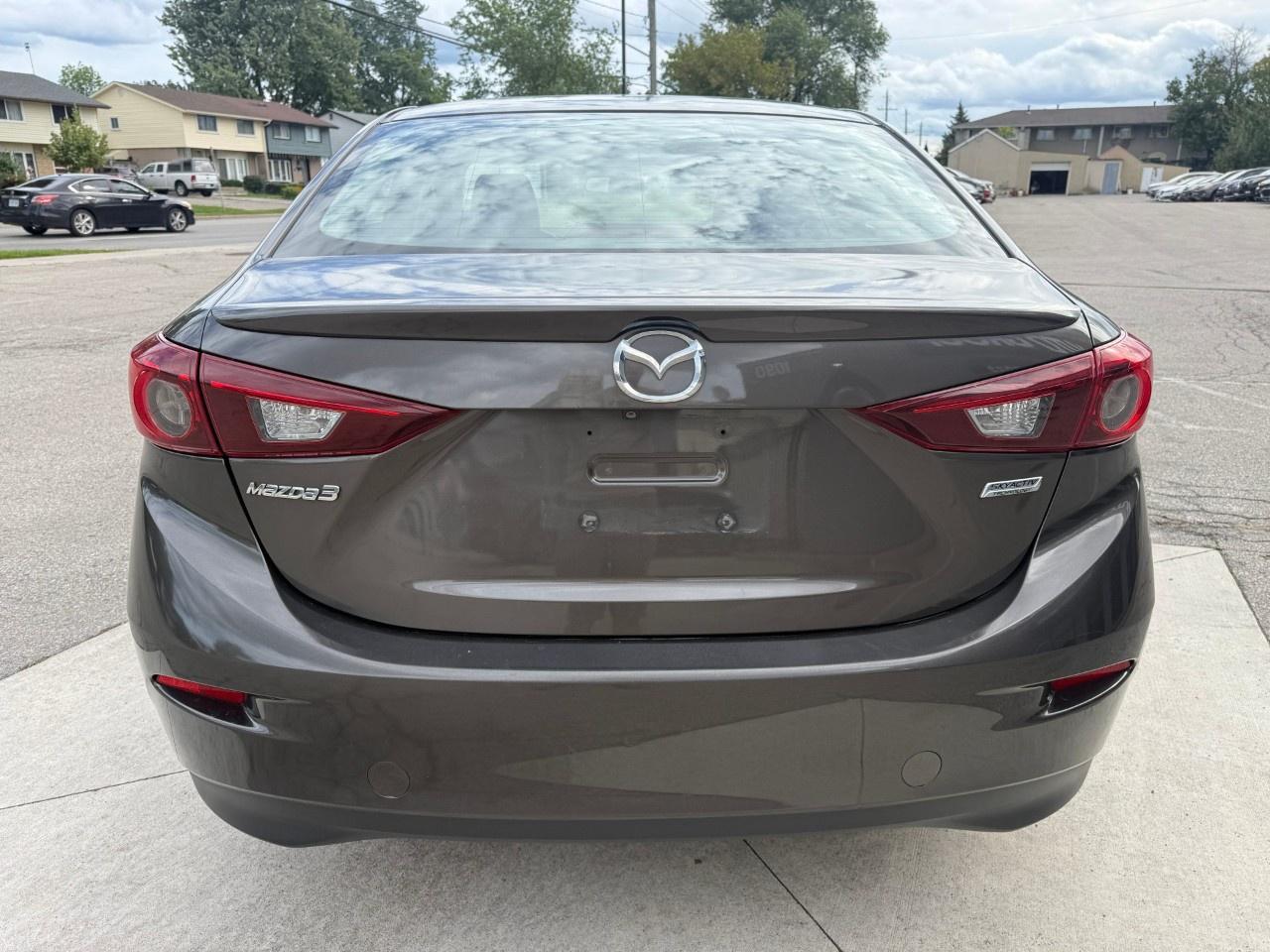 2014 Mazda MAZDA3 4dr Sdn Auto GS-SKY Photo3