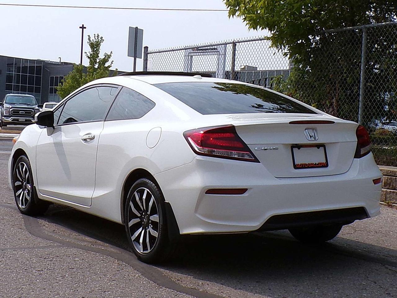 2014 Honda Civic COUPE E-XL CVT NAVI CAMERA SUNROOF H. SEATS 17 ALLOYS B.T. Photo