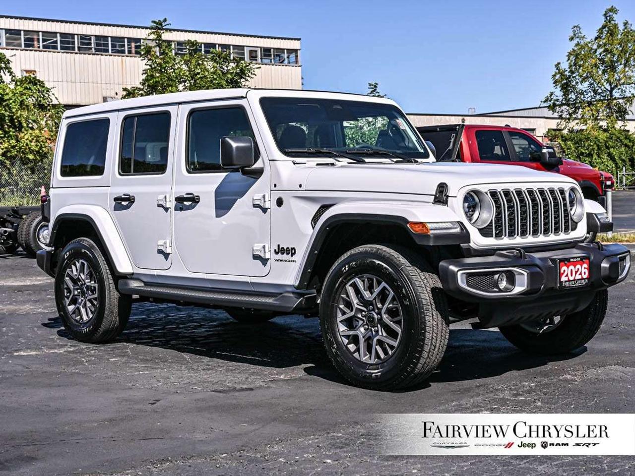 2026 Jeep Wrangler Sahara 4 Door 4x4 SKY TOP   BLIND SPOT   COMPANY CAR   CARPLAY   PARK ASSIST   CARPLAY   HEATED SEATS   HEATED STEERING W Photo