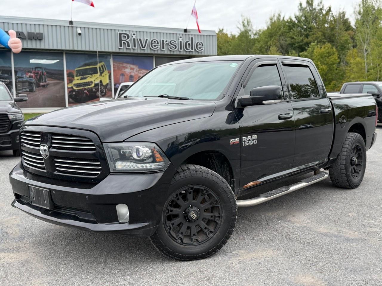 2014 RAM 1500 4WD Crew Cab 5.7 Ft Box Sport Photo