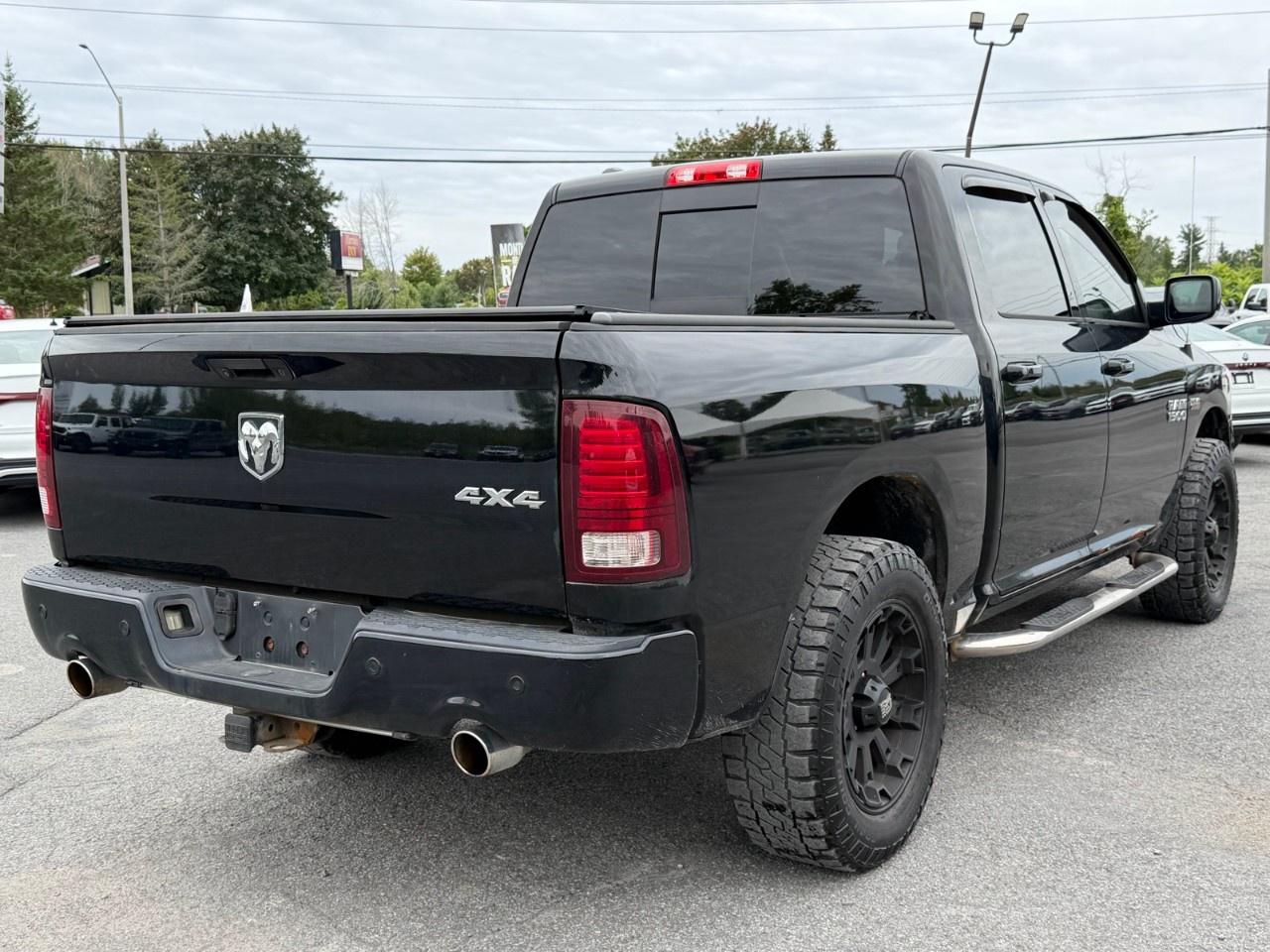 2014 RAM 1500 4WD Crew Cab 5.7 Ft Box Sport Photo4